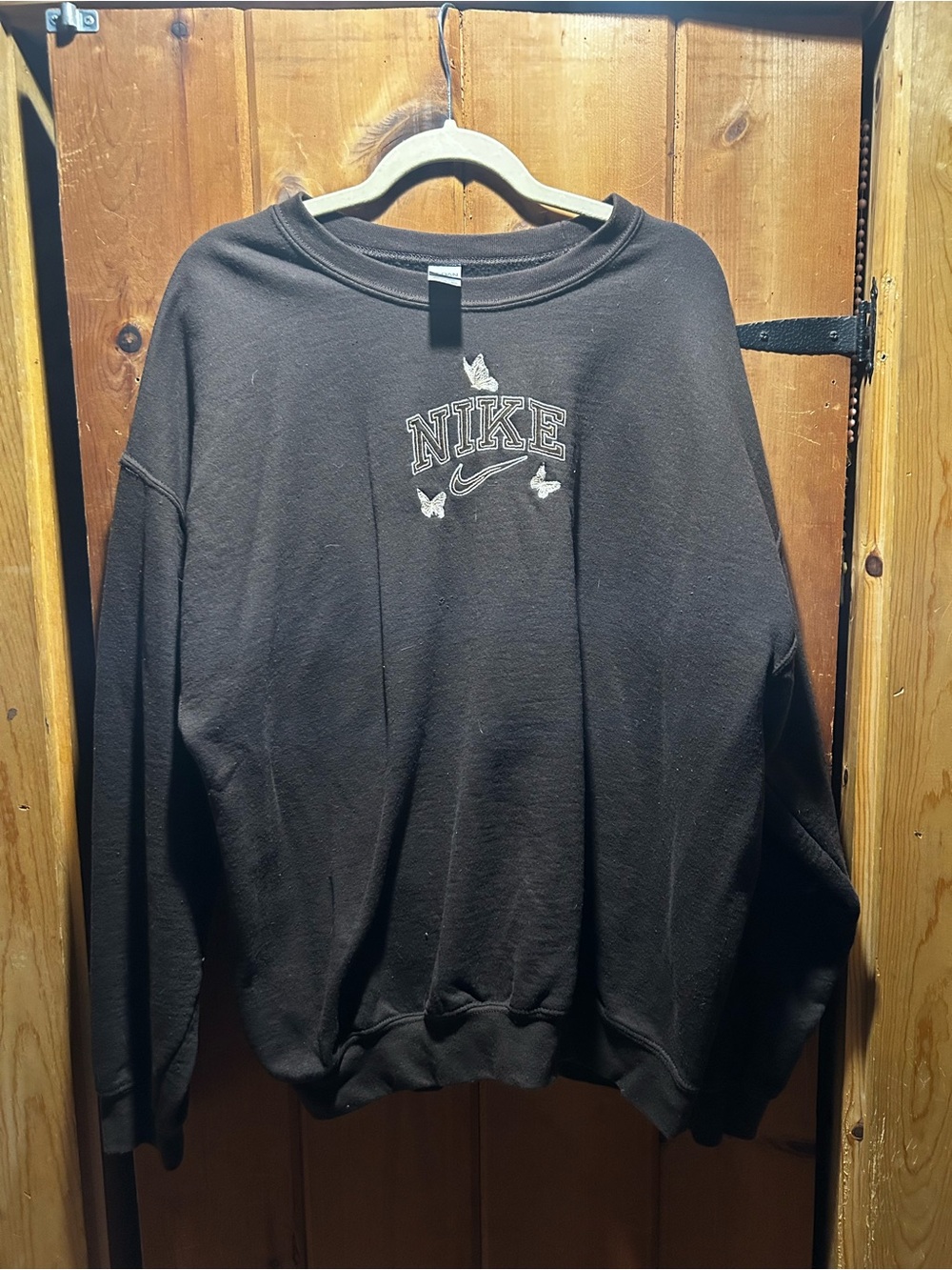 Nike Black Crewneck Sweatshirt with White Embroidered Logo and Butterflies